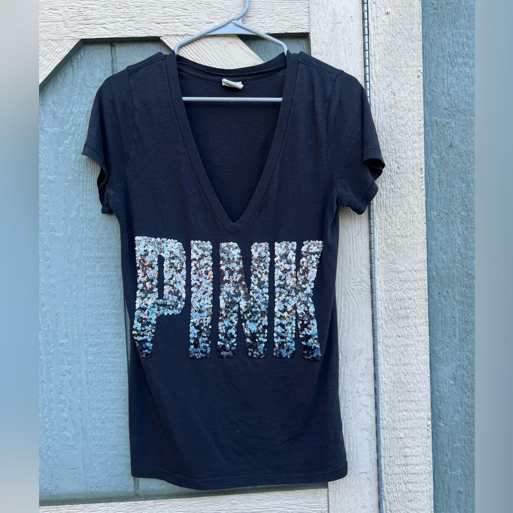 Size medium sequins pink t shirt black with silver writing